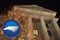 north-carolina map icon and the Internal Revenue Service building in Washington, DC
