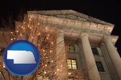 nebraska map icon and the Internal Revenue Service building in Washington, DC