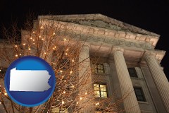 pennsylvania map icon and the Internal Revenue Service building in Washington, DC